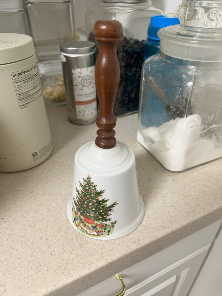 Christmas bell, pepper mill and glass canisters