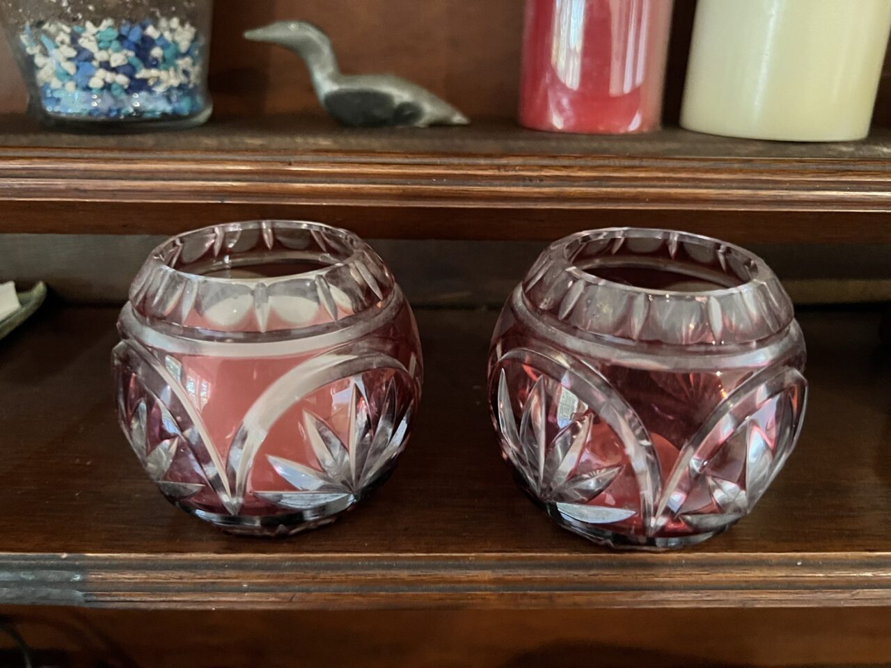 Pair of red cut-crystal candle holders