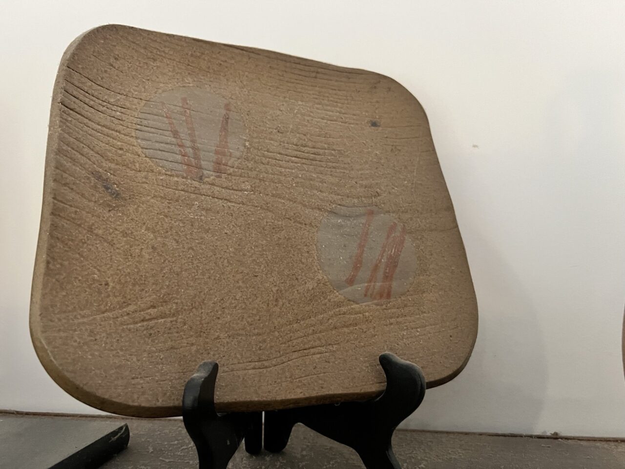 Pottery plate on stand