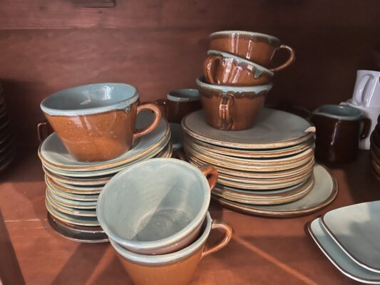 Pottery cups, saucers and plates