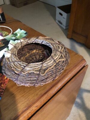 Coiled woven basket