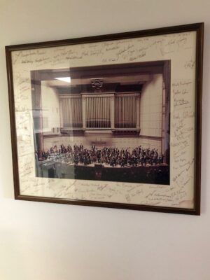 Framed orchestra photo with signatures